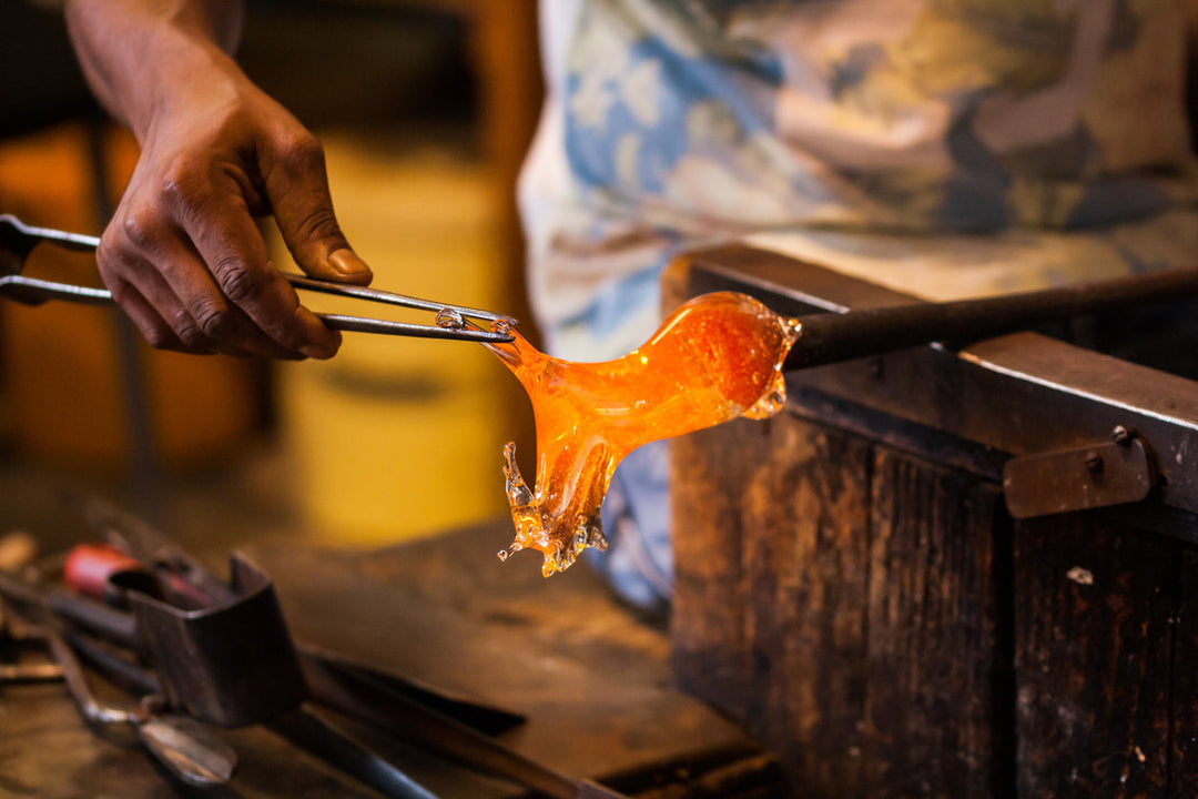 man fusing glass with kiln
