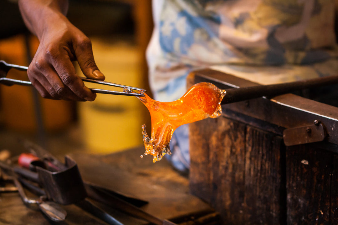 man fusing glass with kiln